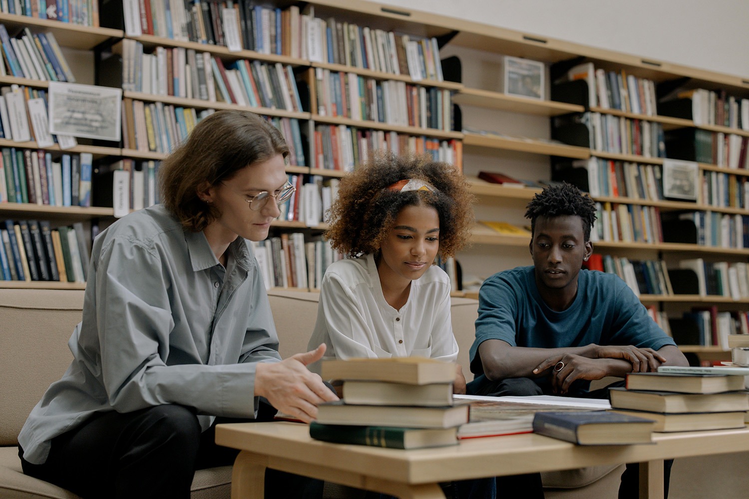 Stock image of students in a library 